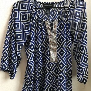 Sheer top with silver sparkle accents! 0X